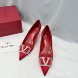 Side profile view of Valentino Garavani luxury piece style No.216