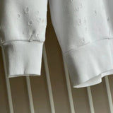 Texture and finish detail of Givenchy luxury piece style No.112