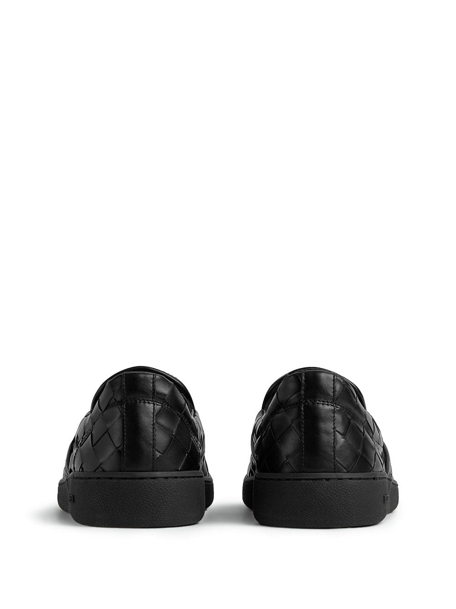 Close-up of Bottega Veneta athletic hardware and fine stitching