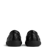 Close-up of Bottega Veneta athletic hardware and fine stitching