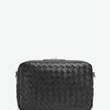 Close-up of Bottega Veneta cross body bags hardware and fine stitching