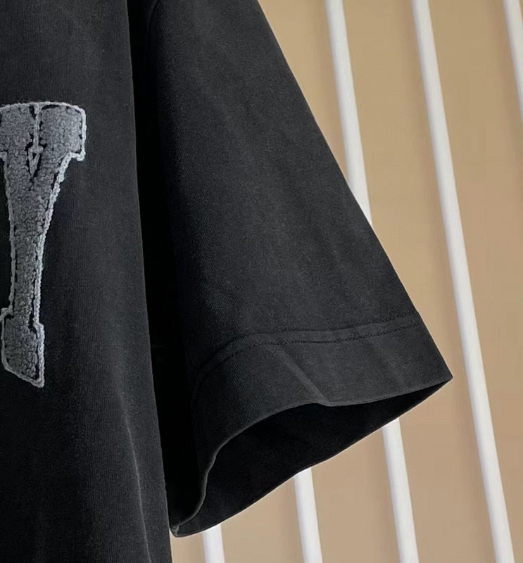 Texture and finish detail of Givenchy luxury piece style No.169