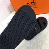 Hermès Chocolate Brown Slip-On Sneakers - Close-Up Texture View