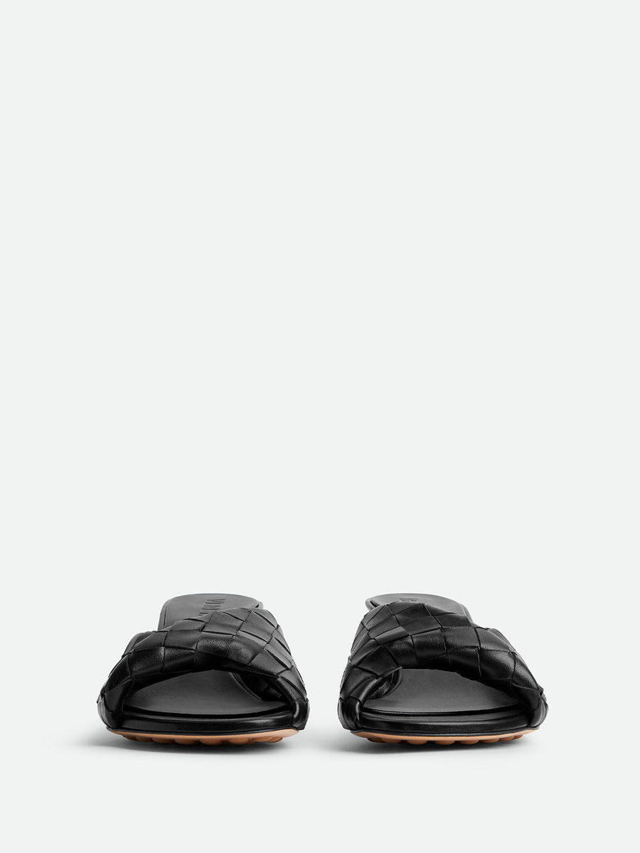 Close-up of Bottega Veneta flats hardware and fine stitching