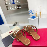 Three-quarter angle view of Valentino Garavani luxury piece style No.243
