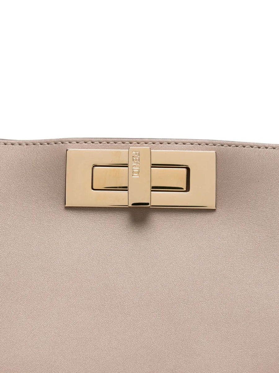 Close-up of Fendi shoulder bags hardware and fine stitching