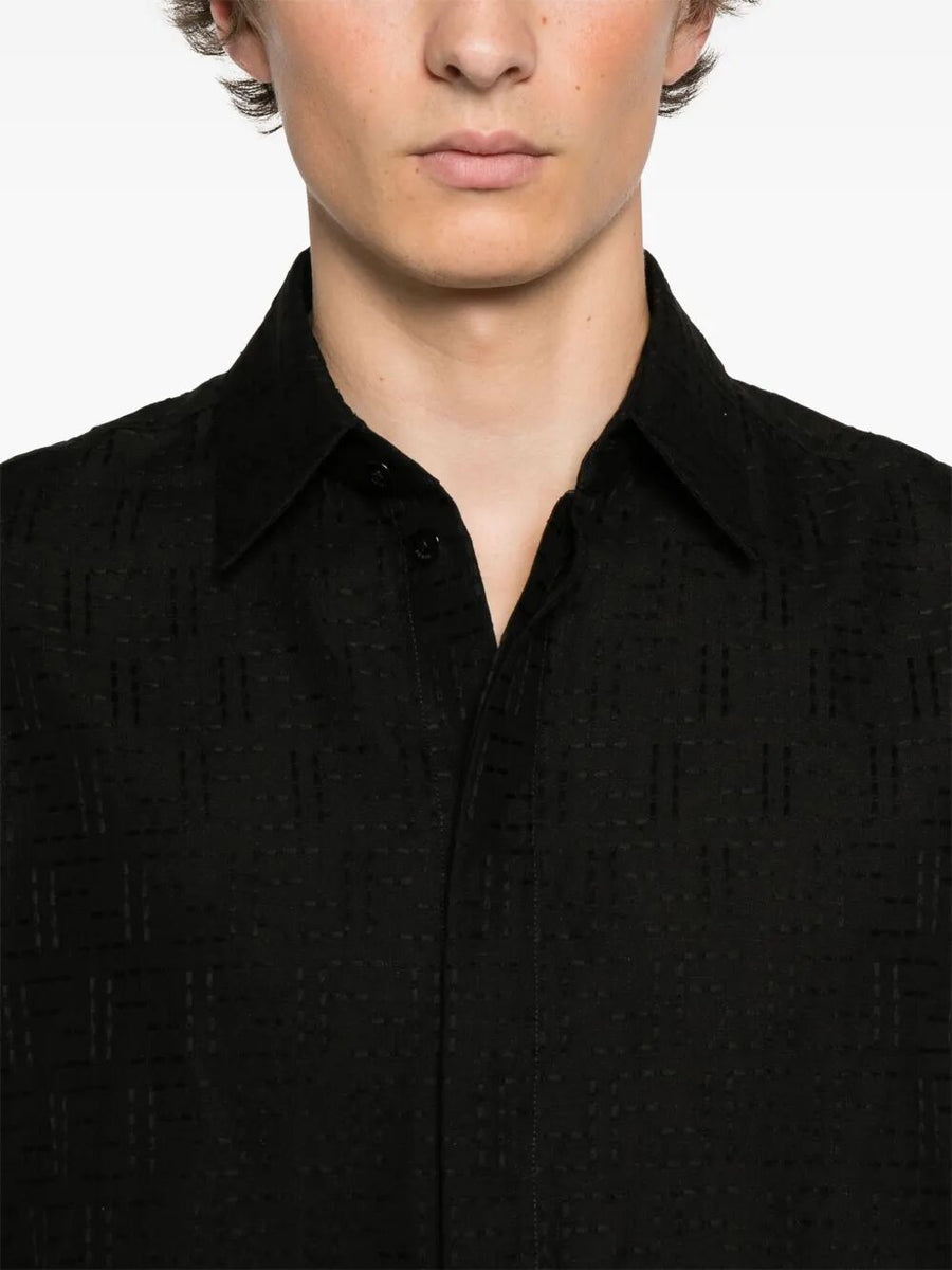 Close-up of Fendi blouses hardware and fine stitching