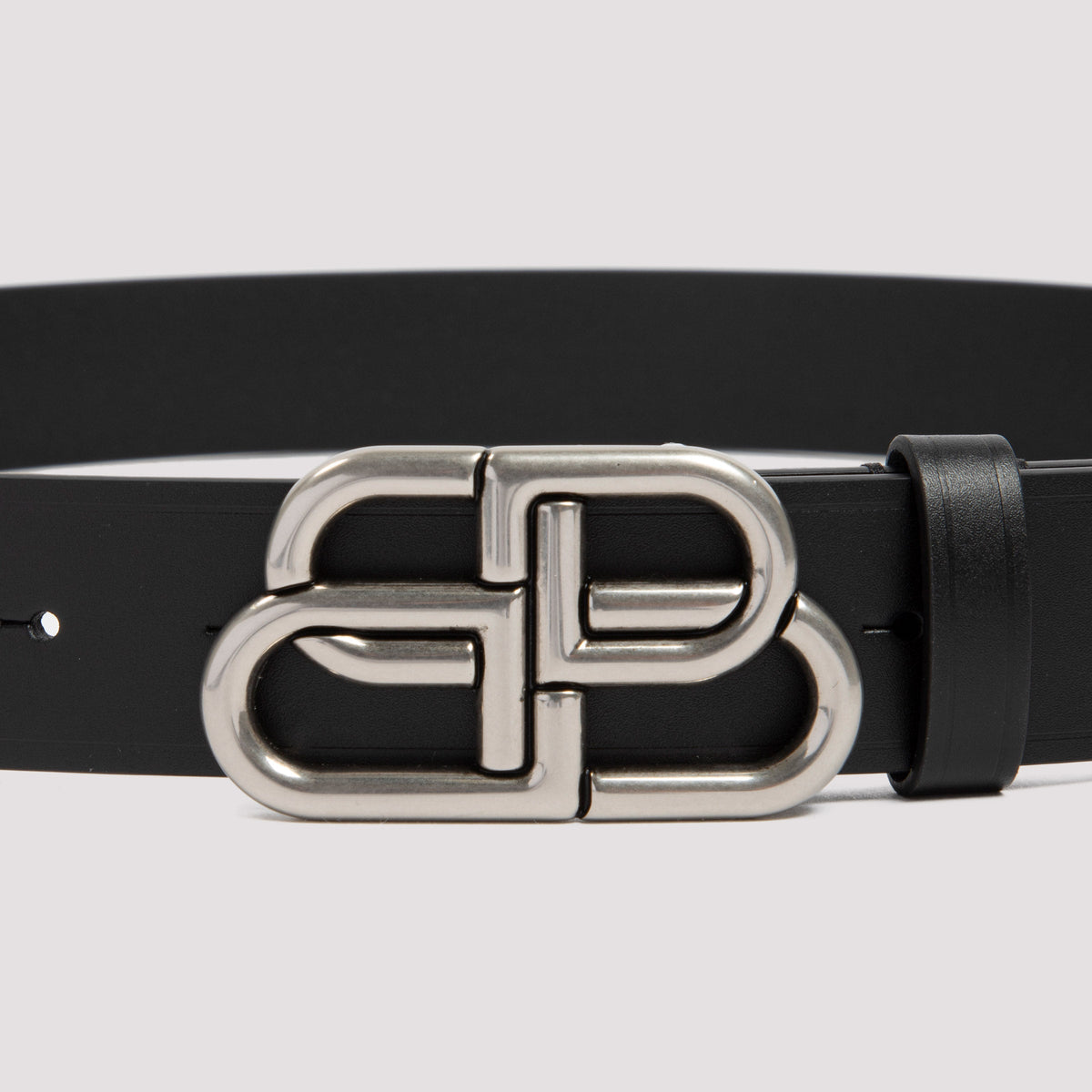 Close-up of Balenciaga belts hardware and fine stitching