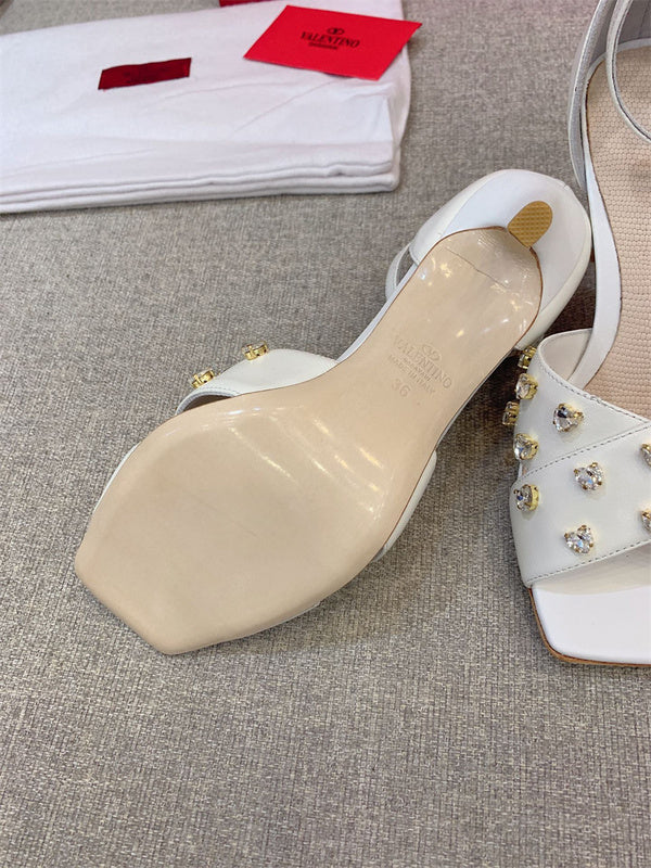 Side profile view of Valentino Garavani luxury piece style No.196