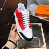 Hermès Red Slip-On Sneakers - Lifestyle Styling Shot