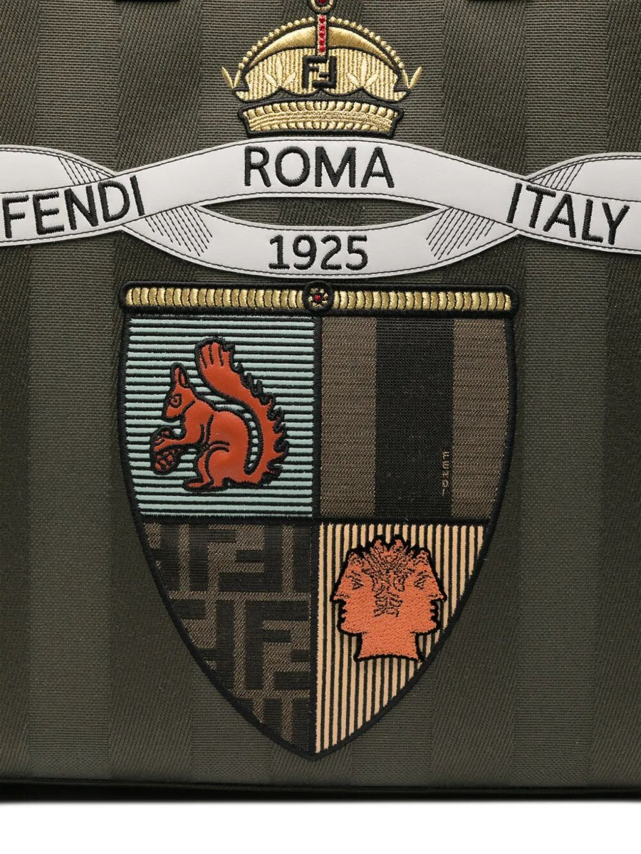 Close-up of Fendi cross body bags hardware and fine stitching