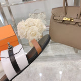 Hermès Chocolate Brown Knee-High Boots - Close-Up Texture View