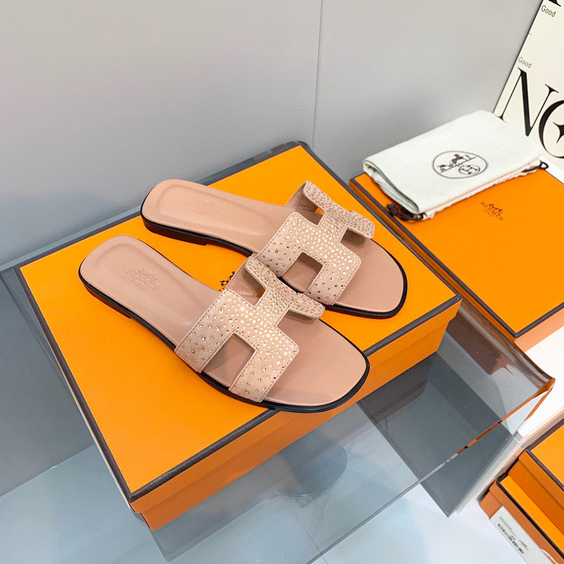 Hermès Beige Slide Sandals - Detail Shot of Craftsmanship