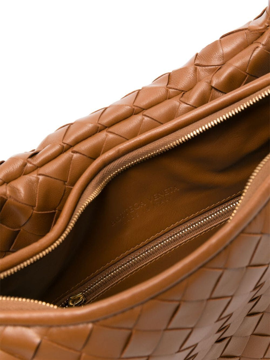 Close-up of Bottega Veneta shoulder bags hardware and fine stitching