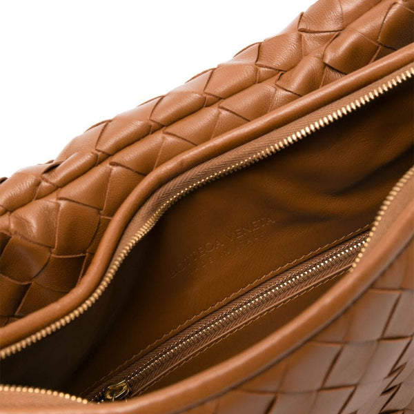 Close-up of Bottega Veneta shoulder bags hardware and fine stitching