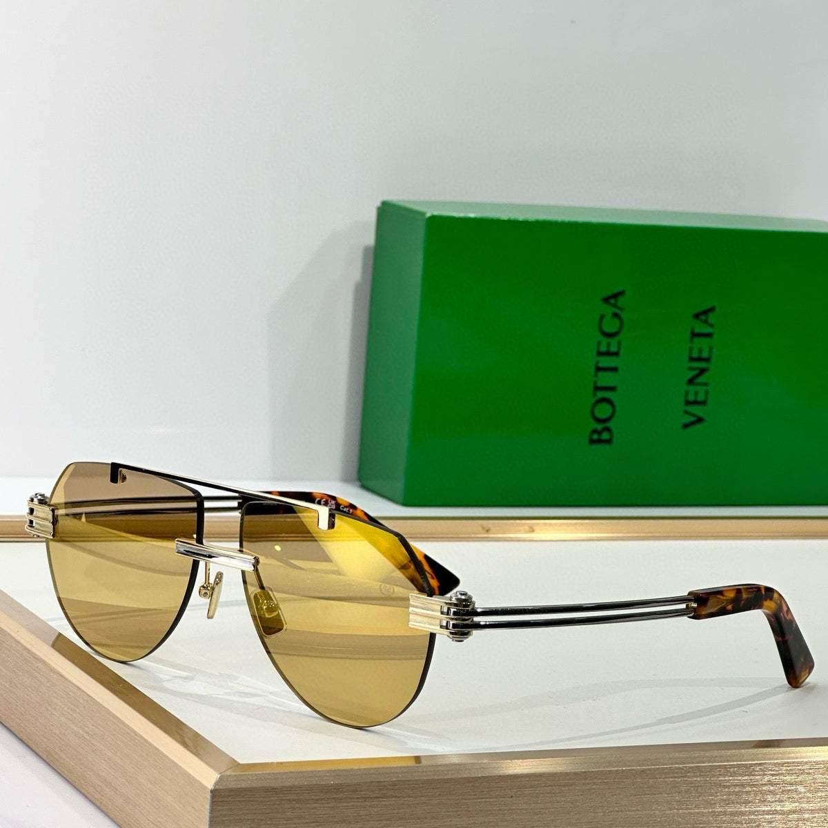 Bottega Veneta Sunglasses detail shot – authentic designer craftsmanship