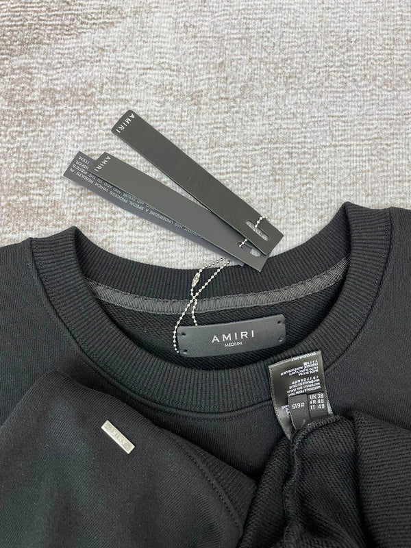 Front view of Amiri luxury piece style No.062