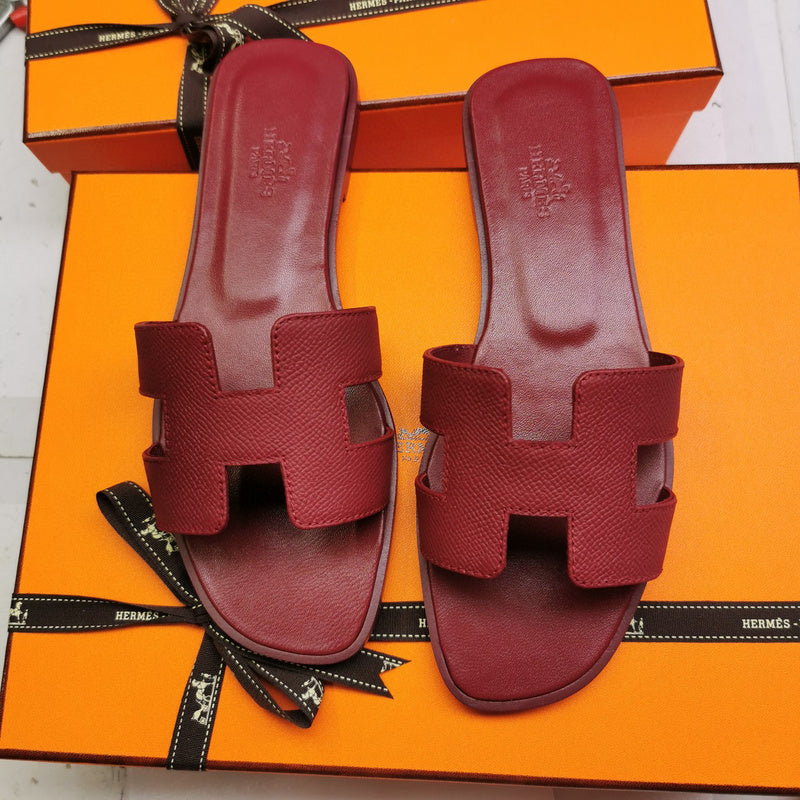Hermes sandals Style 026 - close-up of iconic logo design