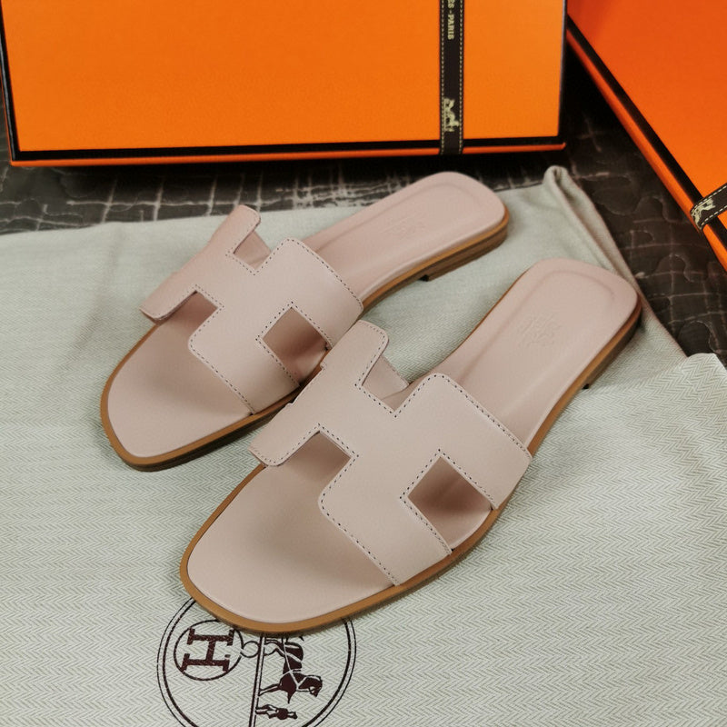 Hermès Chocolate Brown Flat Thong Sandals - Lifestyle Styling Shot