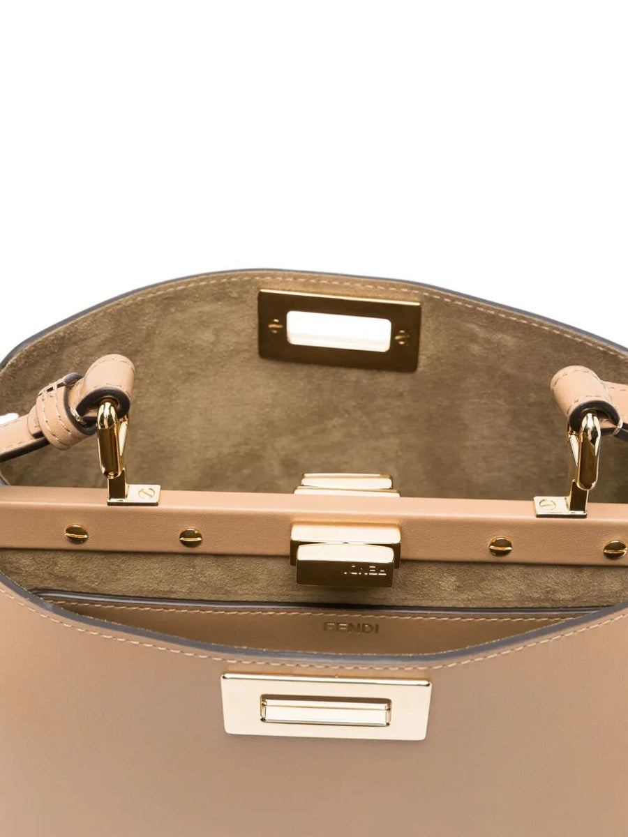 Close-up of Fendi shoulder bags hardware and fine stitching