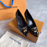 Close-up detail view of Louis Vuitton luxury piece style No.054