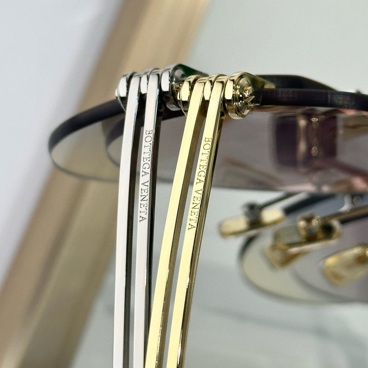 Bottega Veneta Sunglasses detail shot – authentic designer craftsmanship
