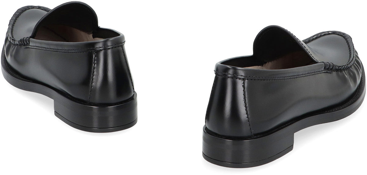 Close-up of Prada sandals hardware and fine stitching