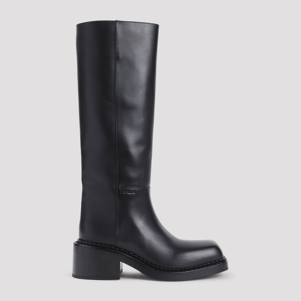 Close-up of Prada boots hardware and fine stitching