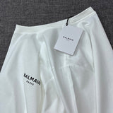 Side profile view of Balmain luxury piece style No.064