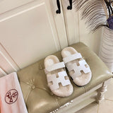Hermès Grey Slide Sandals - Angled View