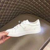 Hermes shoes Style 103 - close-up of statement logo accent