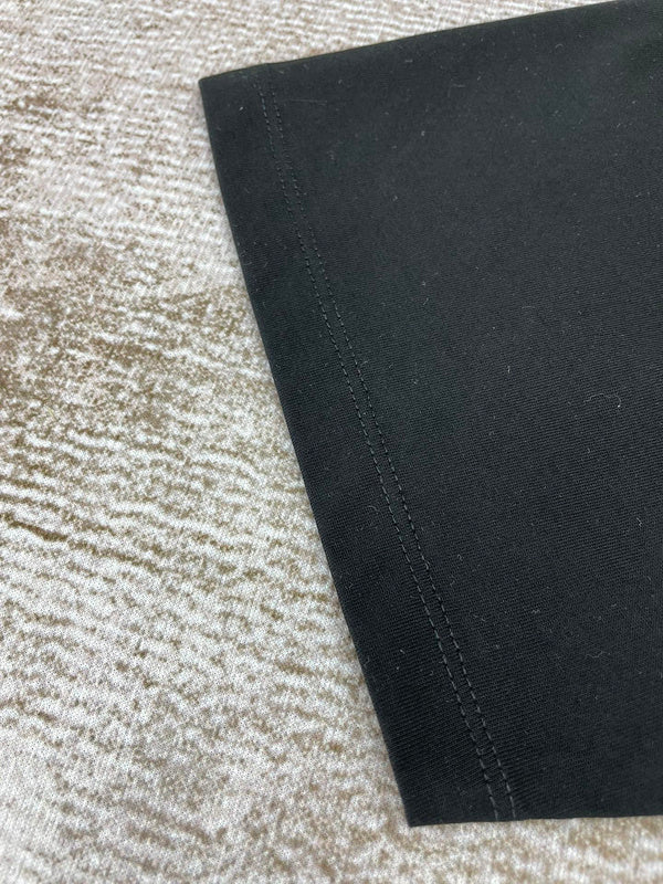 Three-quarter angle view of Amiri luxury piece style No.185