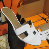 Hermes sandals Style 017 - angled studio shot