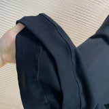 Close-up of Balenciaga designer clothing craftsmanship