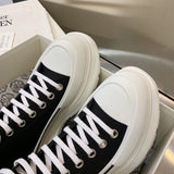Alexander McQueen White Chunky Platform Sneakers - Heel Detail View