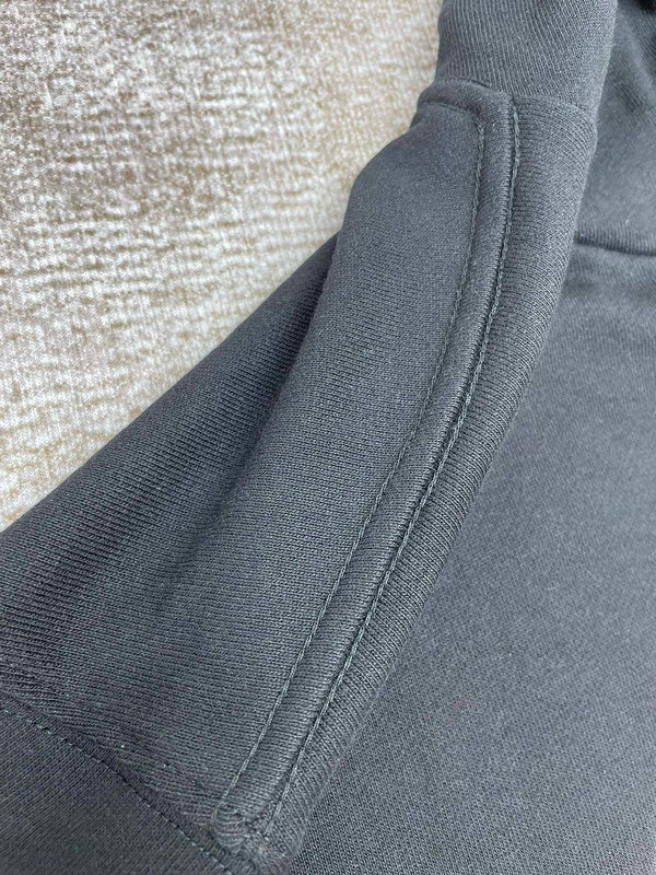 Three-quarter angle view of Amiri luxury piece style No.009