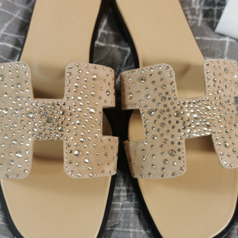 Hermes sandals Style 145 - angled studio shot