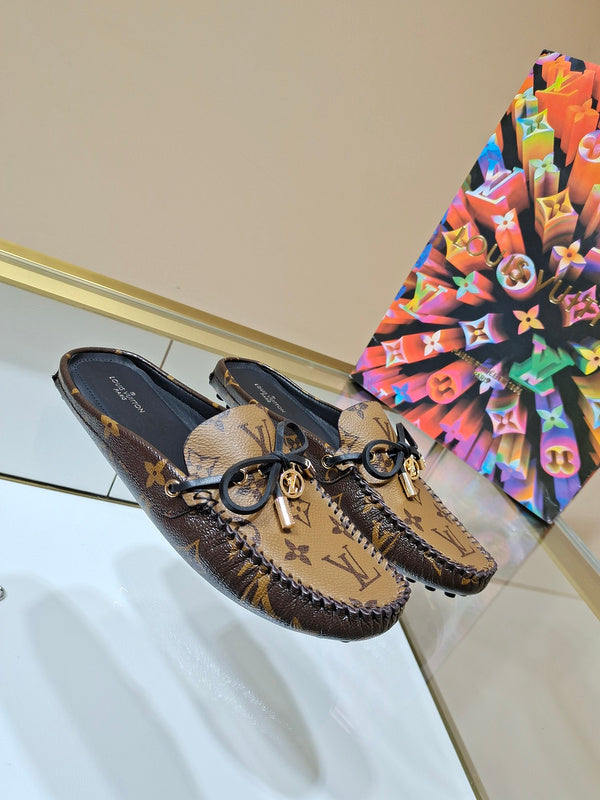 Louis Vuitton White Low-Top Sneakers - Angled View