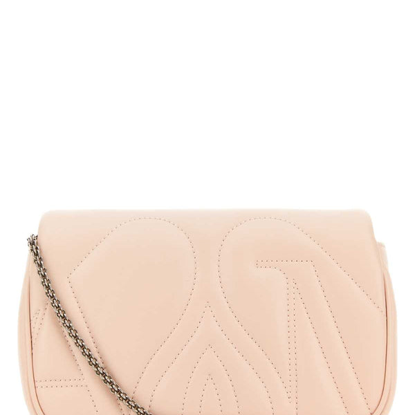 Alexander McQueen clutches side profile designer luxury fashion