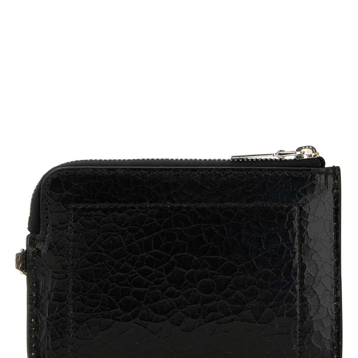 Alexander McQueen wallets side profile designer luxury fashion