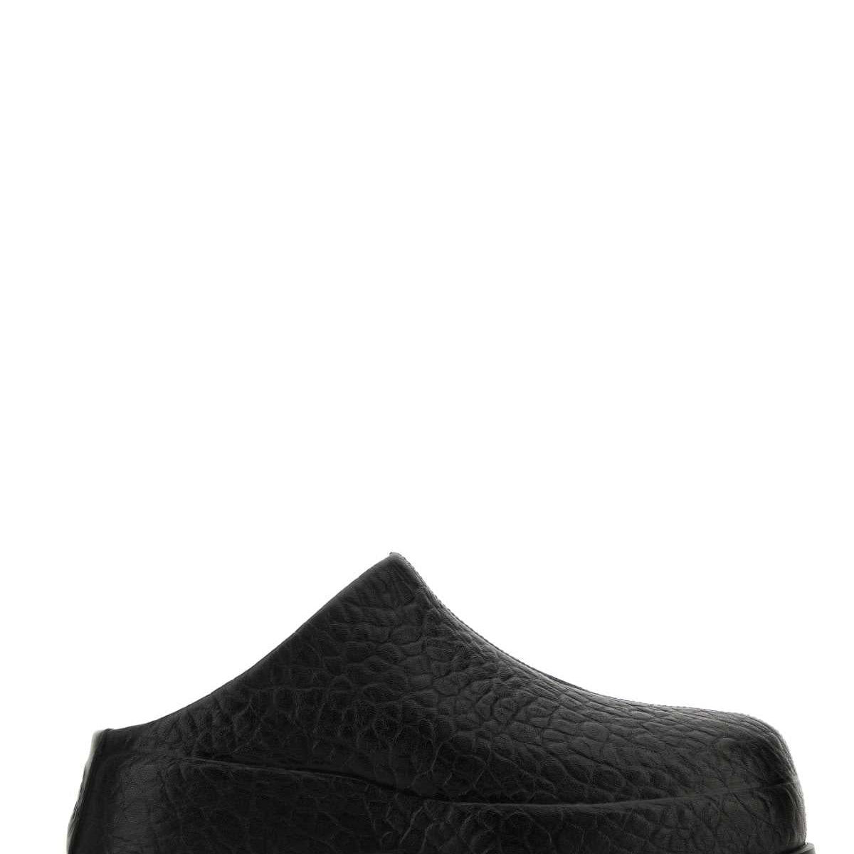 Alexander McQueen slides luxury designer piece front view