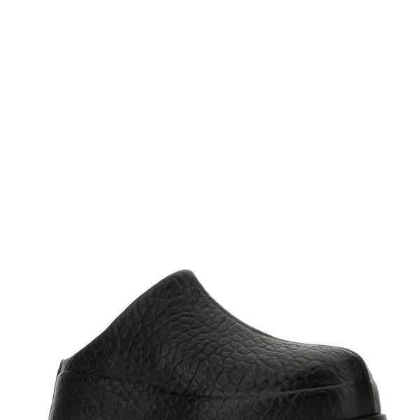 Alexander McQueen premium slides detail and craftsmanship close-up