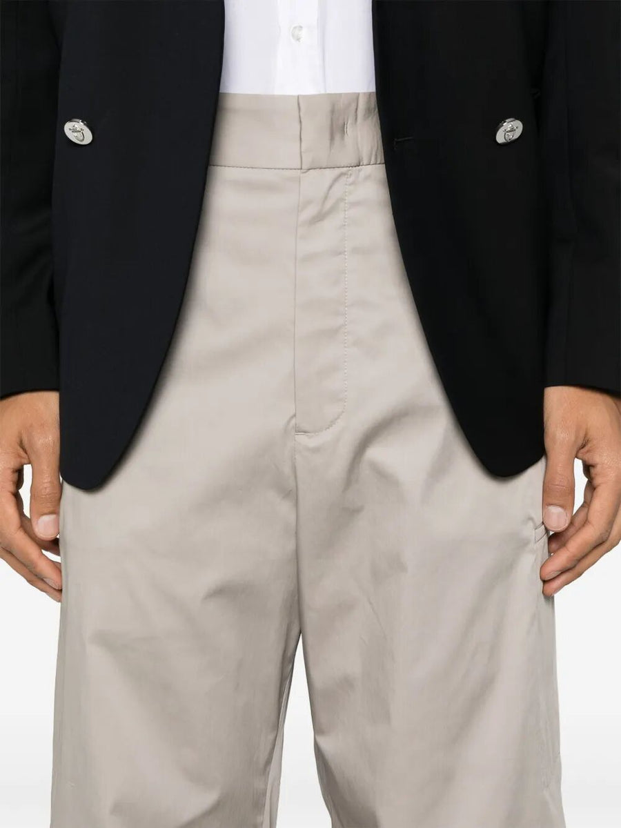 Close-up of Fendi pants hardware and fine stitching