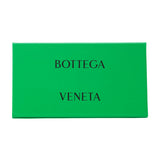 Close-up of Bottega Veneta sunglasses hardware and fine stitching
