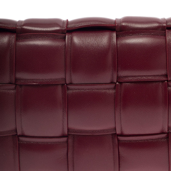 Close-up of Bottega Veneta cross body bags hardware and fine stitching