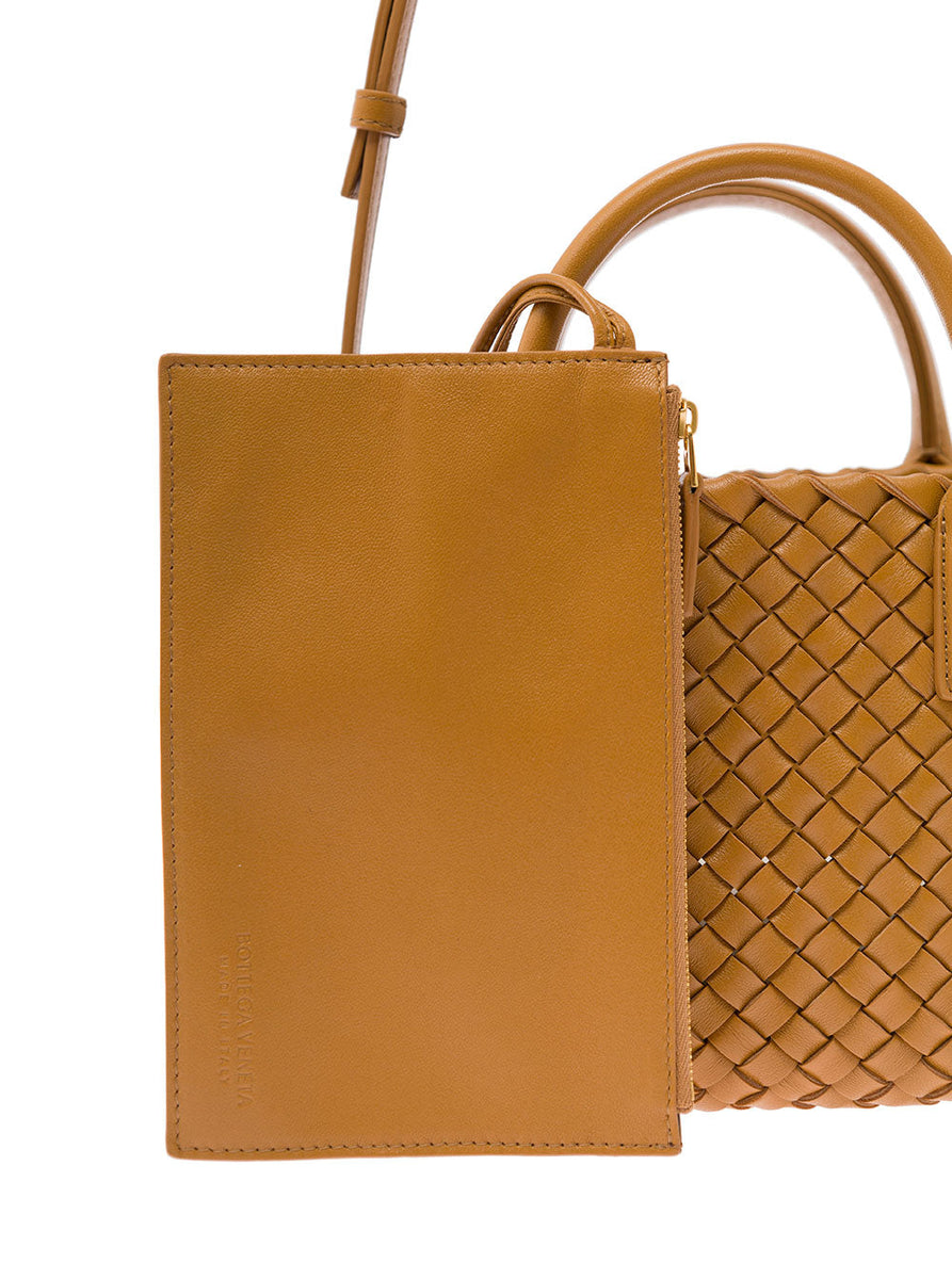 Close-up of Bottega Veneta shoulder bags hardware and fine stitching