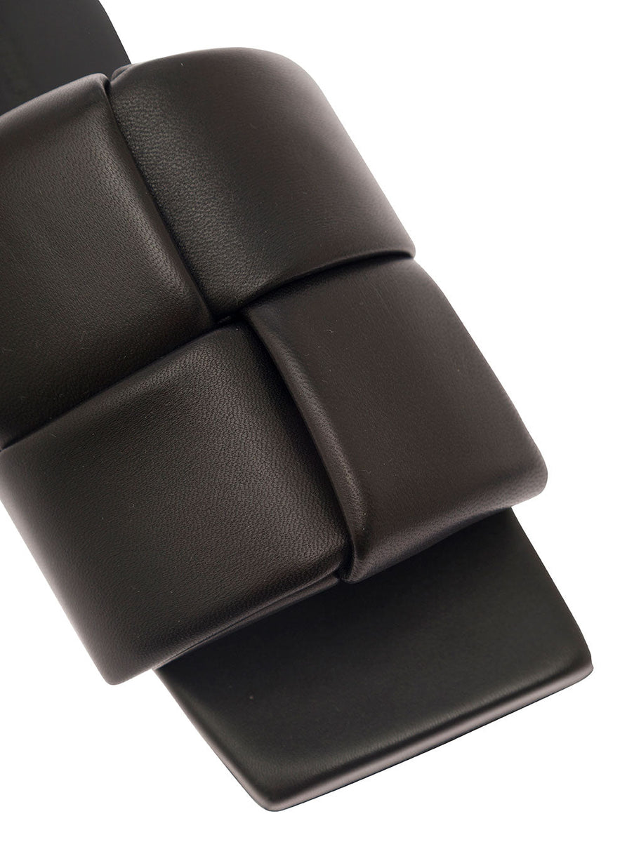 Close-up of Bottega Veneta flats hardware and fine stitching