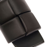 Close-up of Bottega Veneta flats hardware and fine stitching