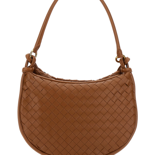 Close-up of Bottega Veneta cross body bags hardware and fine stitching