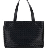 Close-up of Bottega Veneta totes hardware and fine stitching